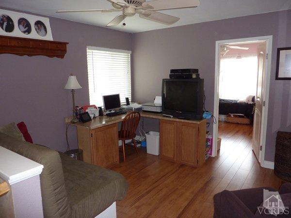 2430 Invar Court Simi Valley, CA 93065 - Photo 21 of 26 a view of a workspace with furniture and a window