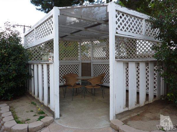 2430 Invar Court Simi Valley, CA 93065 - Photo 23 of 26 a view of a brick wall with a outdoor space