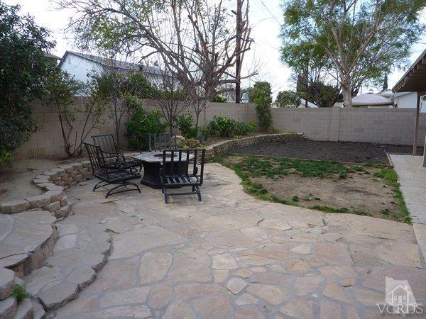 2430 Invar Court Simi Valley, CA 93065 - Photo 24 of 26 a view of a backyard with sitting area