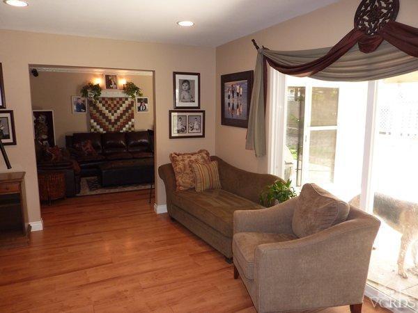 2430 Invar Court Simi Valley, CA 93065 - Photo 8 of 26 a living room with furniture and a flat screen tv