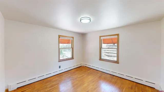 an empty room with windows