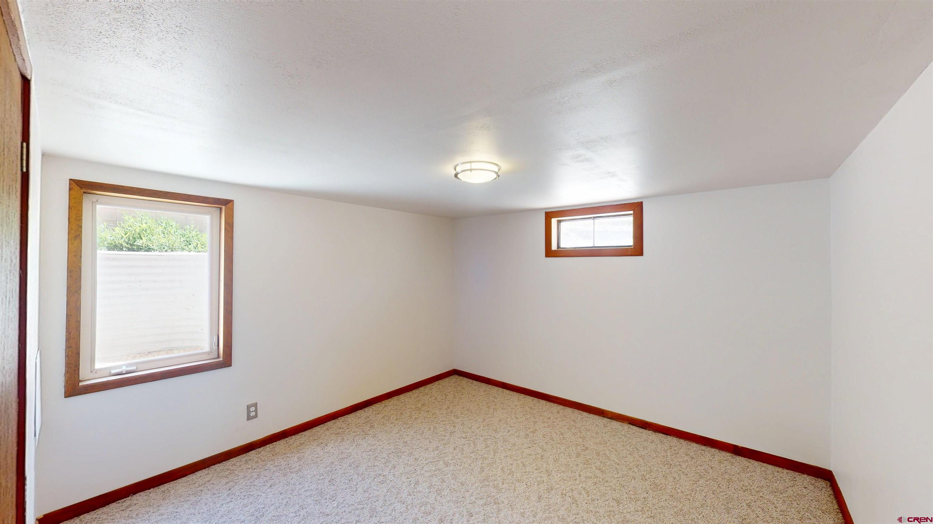 320 Grand Boulevard Delta, CO 81416 - Photo 18 of 38 a view of an empty room with a window