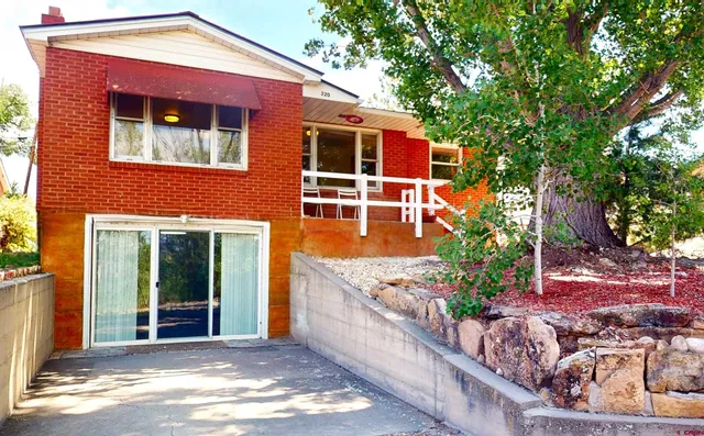 a front view of a house with a porch