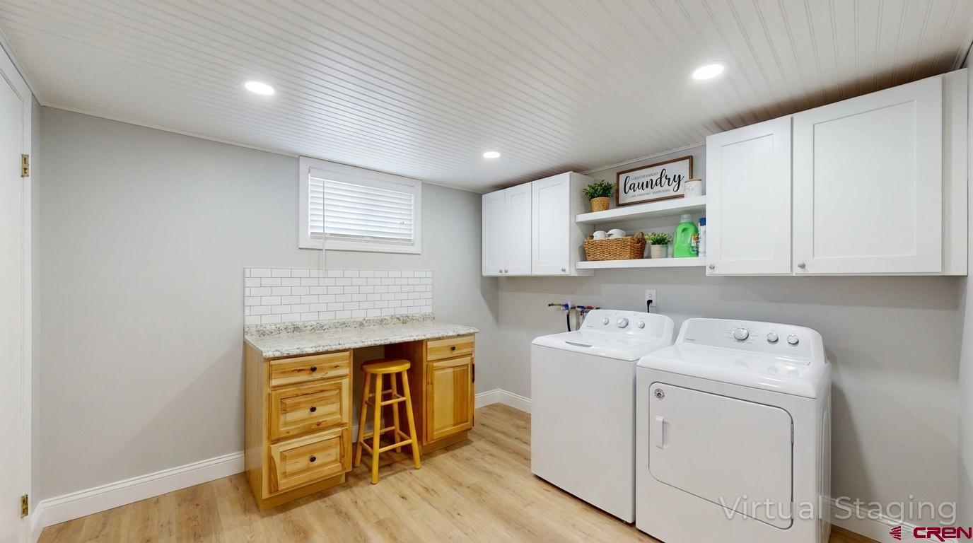 320 Grand Boulevard Delta, CO 81416 - Photo 27 of 38 a utility room with dryer and washer