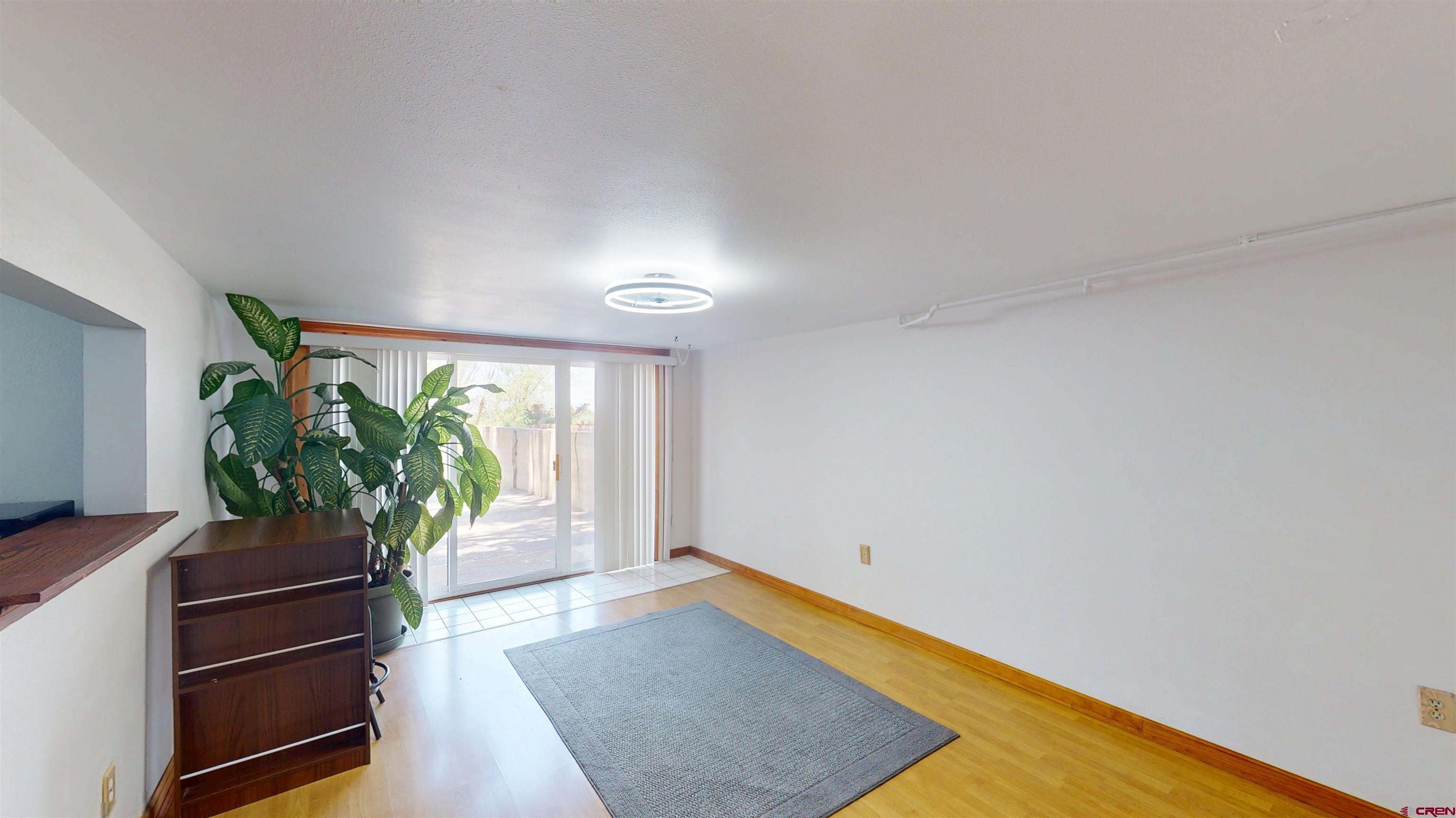 320 Grand Boulevard Delta, CO 81416 - Photo 29 of 38 a room with window and a potted plant