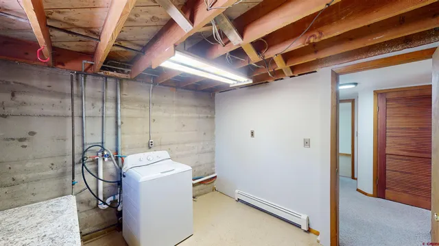 a view of storage and utility room