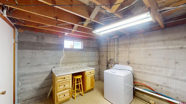 a bathroom with a sink and mirror