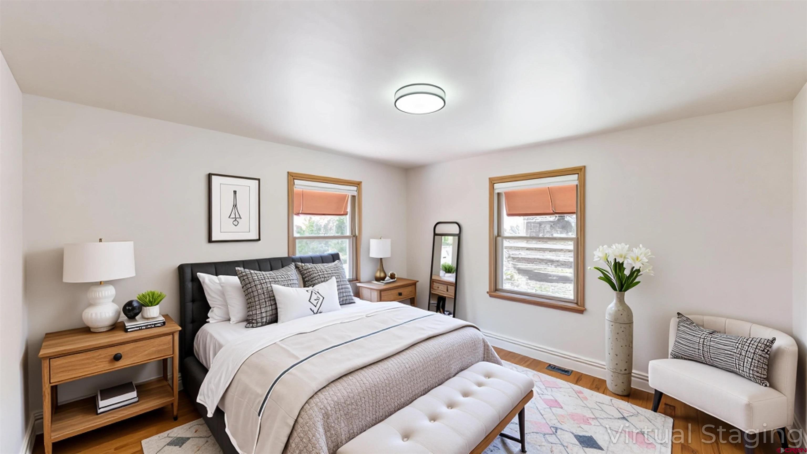320 Grand Boulevard Delta, CO 81416 - Photo 8 of 38 a bedroom with a bed and a window