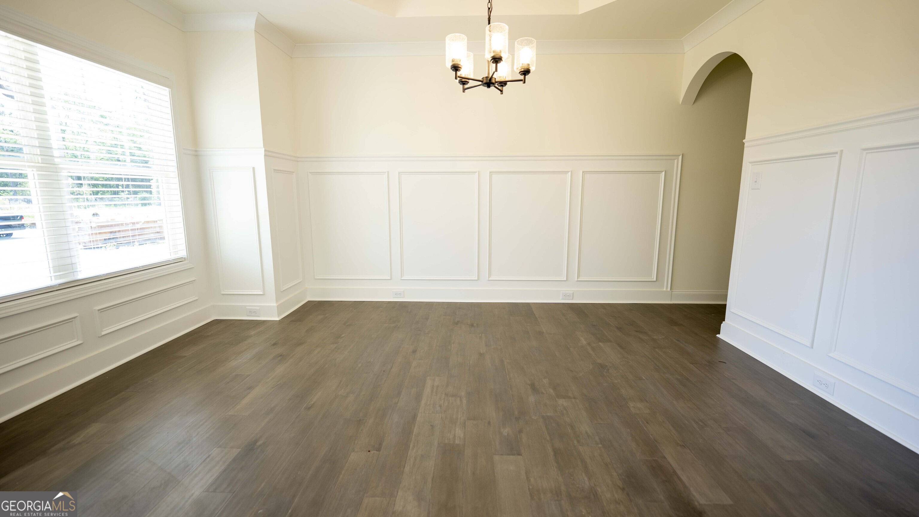 124 Bluecoat Trail Byron, GA 31008 - Photo 23 of 86 wooden floor in an empty room with a window