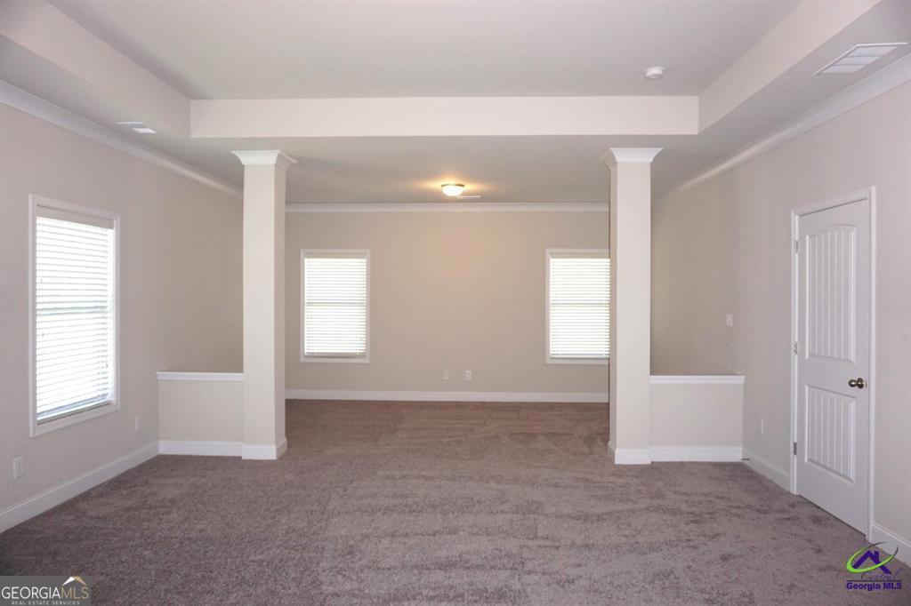 124 Bluecoat Trail Byron, GA 31008 - Photo 38 of 86 an empty room with windows and closet