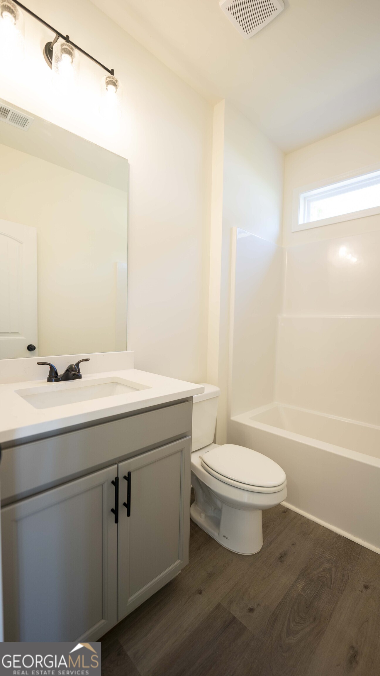 124 Bluecoat Trail Byron, GA 31008 - Photo 39 of 86 a bathroom with a sink a toilet and shower