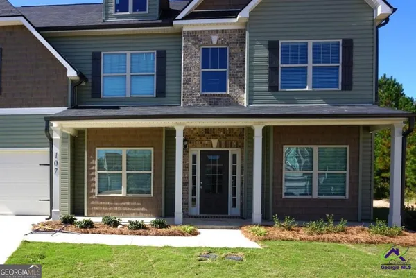 a front view of house with yard