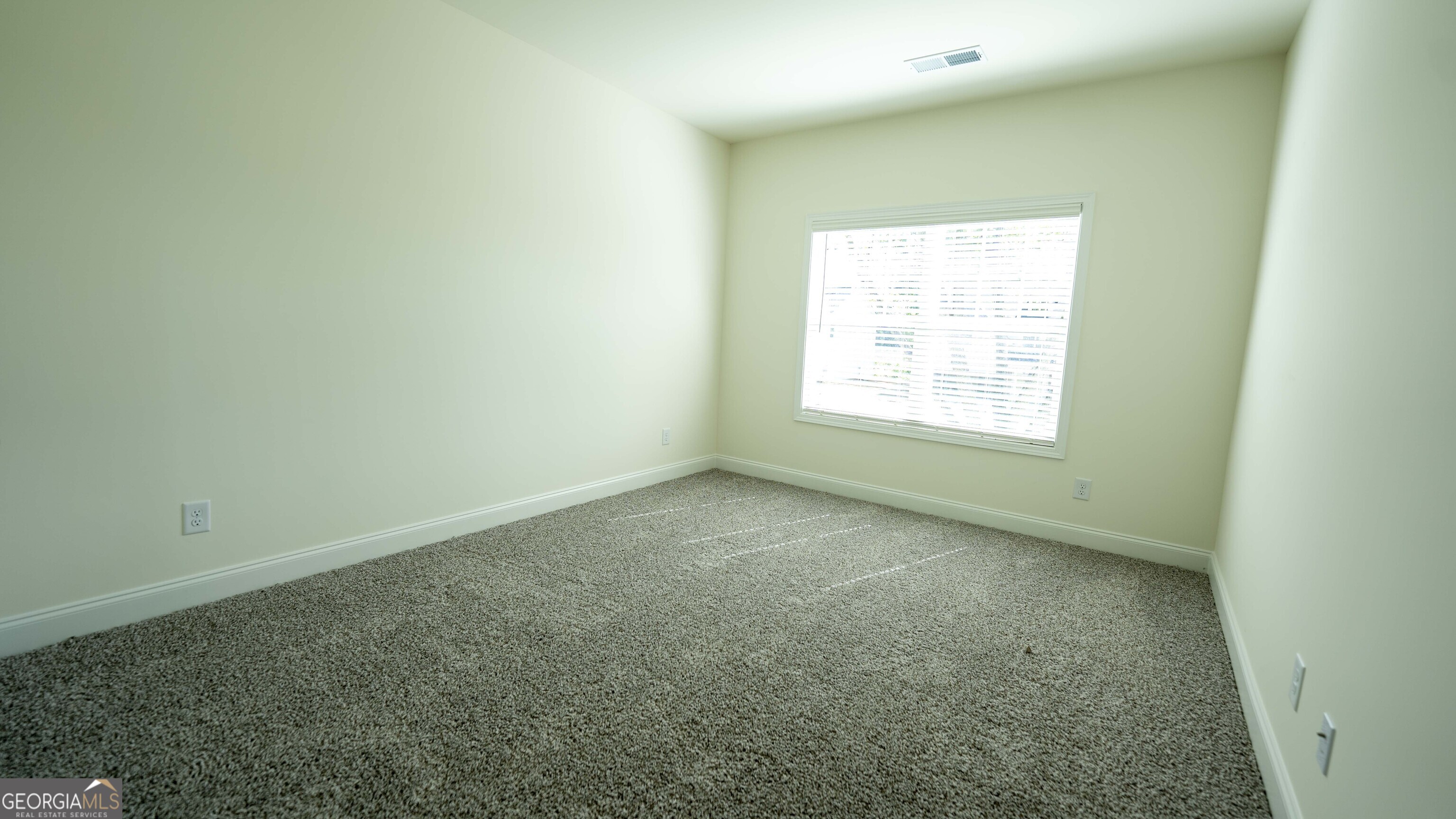 124 Bluecoat Trail Byron, GA 31008 - Photo 57 of 86 an empty room with a window