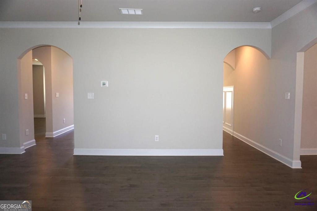 124 Bluecoat Trail Byron, GA 31008 - Photo 70 of 86 an empty room with wooden floor and windows