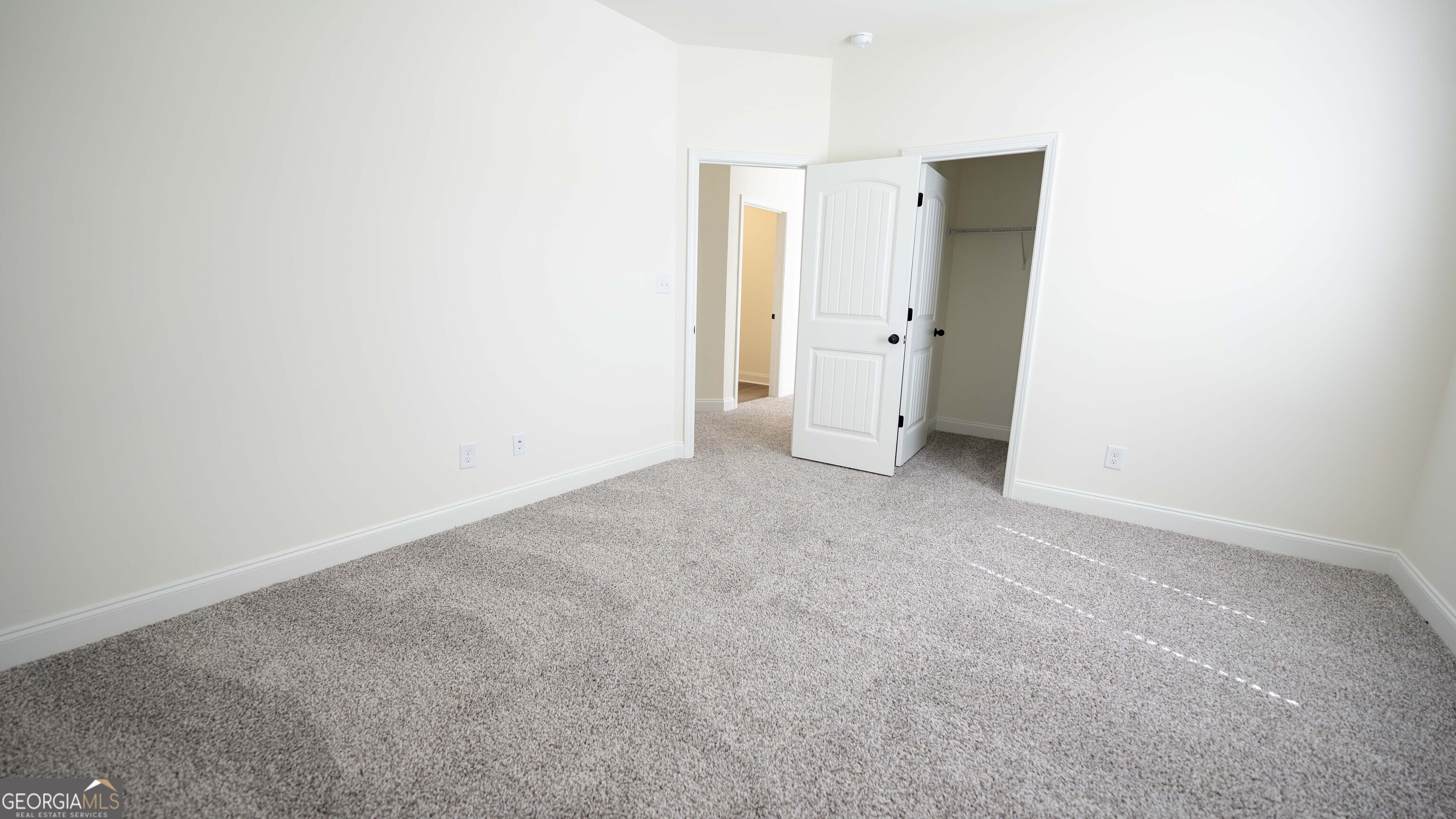124 Bluecoat Trail Byron, GA 31008 - Photo 73 of 86 an empty room with an entrance and closet