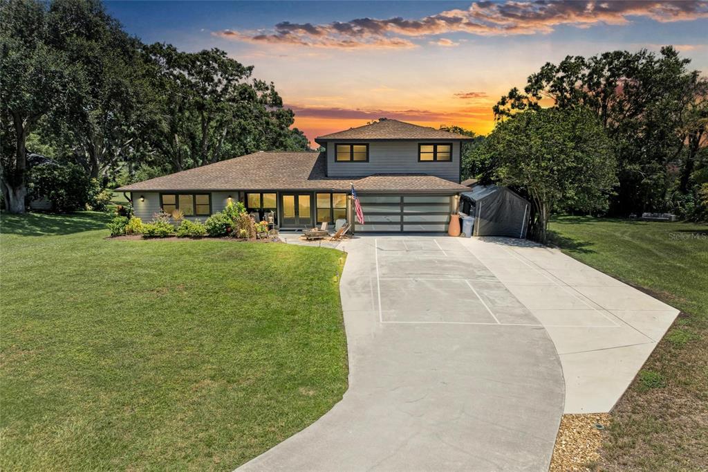 front view of a house with a yard
