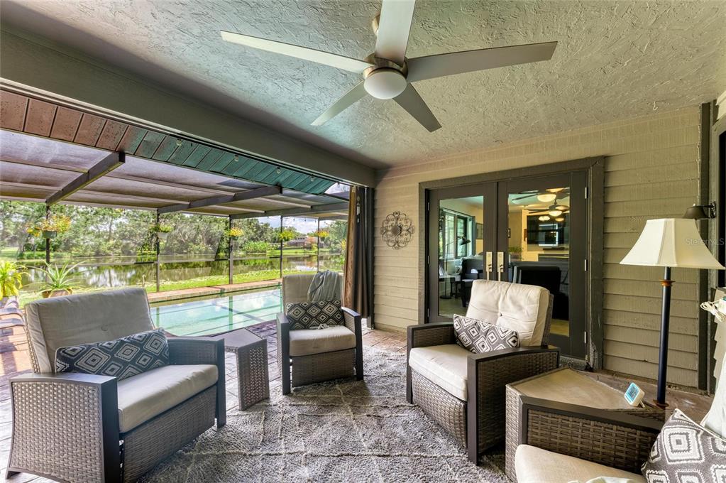6114 Cypress Circle Bradenton, FL 34202 - Photo 32 of 67 a living room with furniture and a large window