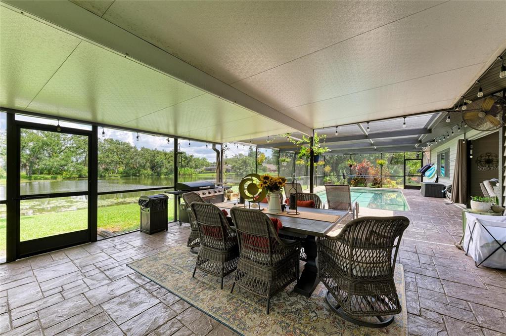 6114 Cypress Circle Bradenton, FL 34202 - Photo 35 of 67 a view of a dining room with furniture window and outside view