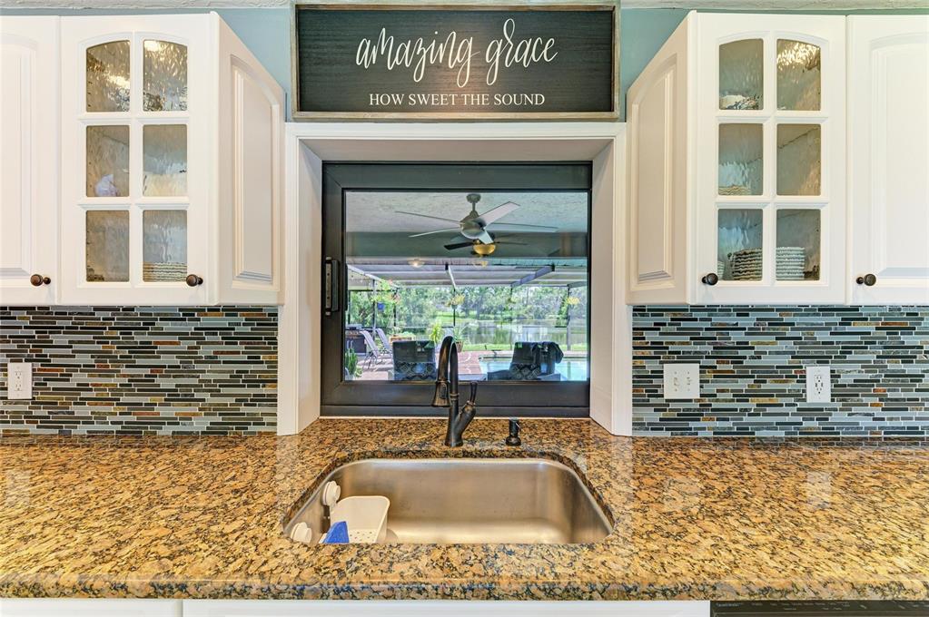 6114 Cypress Circle Bradenton, FL 34202 - Photo 45 of 67 a front door view of a house with a yard