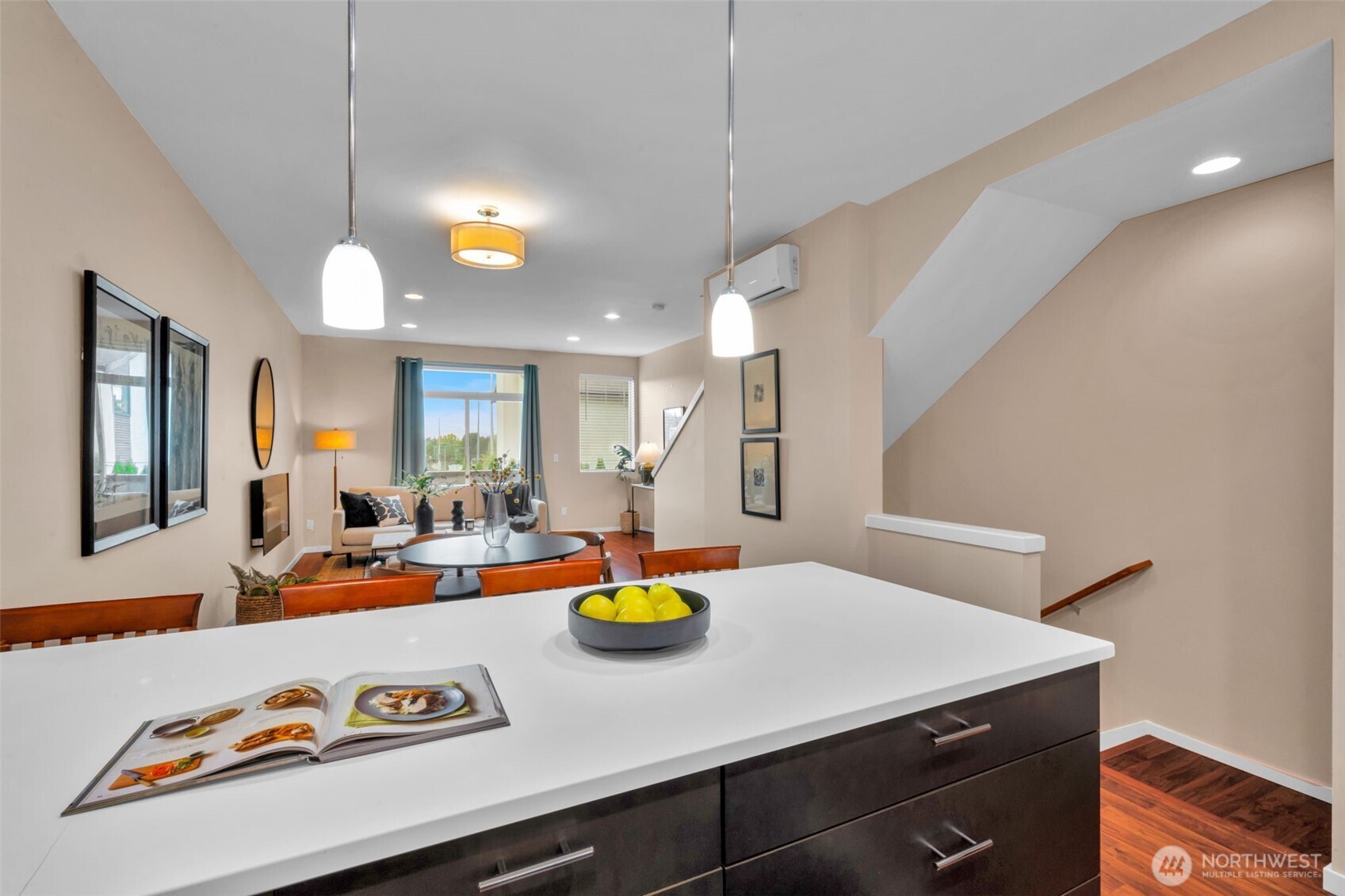 2311 North 113th Place, Unit B Seattle, WA 98133 - Photo 13 of 36 a view of a dining room with furniture and a chandelier fan