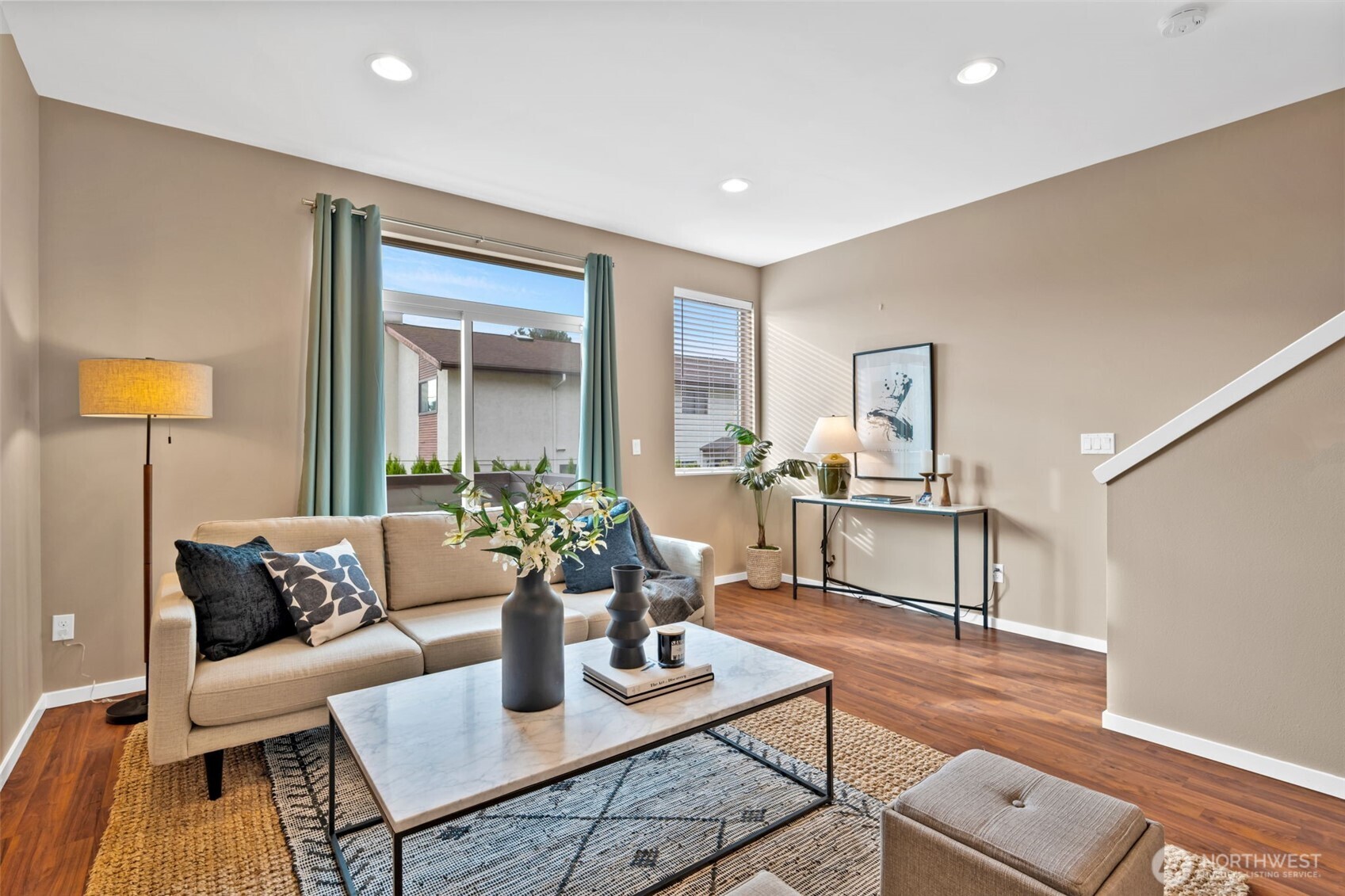 2311 North 113th Place, Unit B Seattle, WA 98133 - Photo 21 of 36 a living room with furniture and a wooden floor