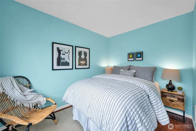 a blue bench sitting in front of a building