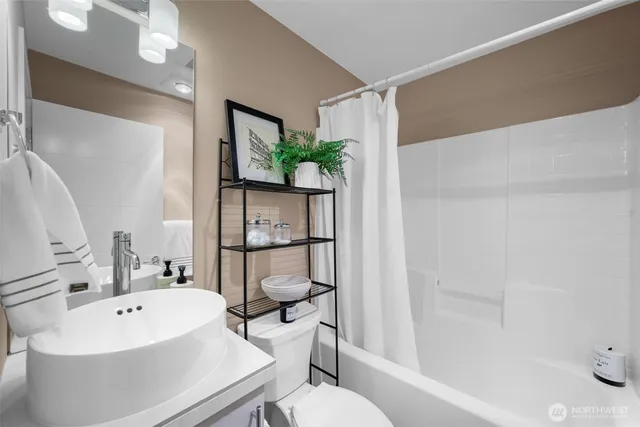 a bathroom with a sink and a bathtub