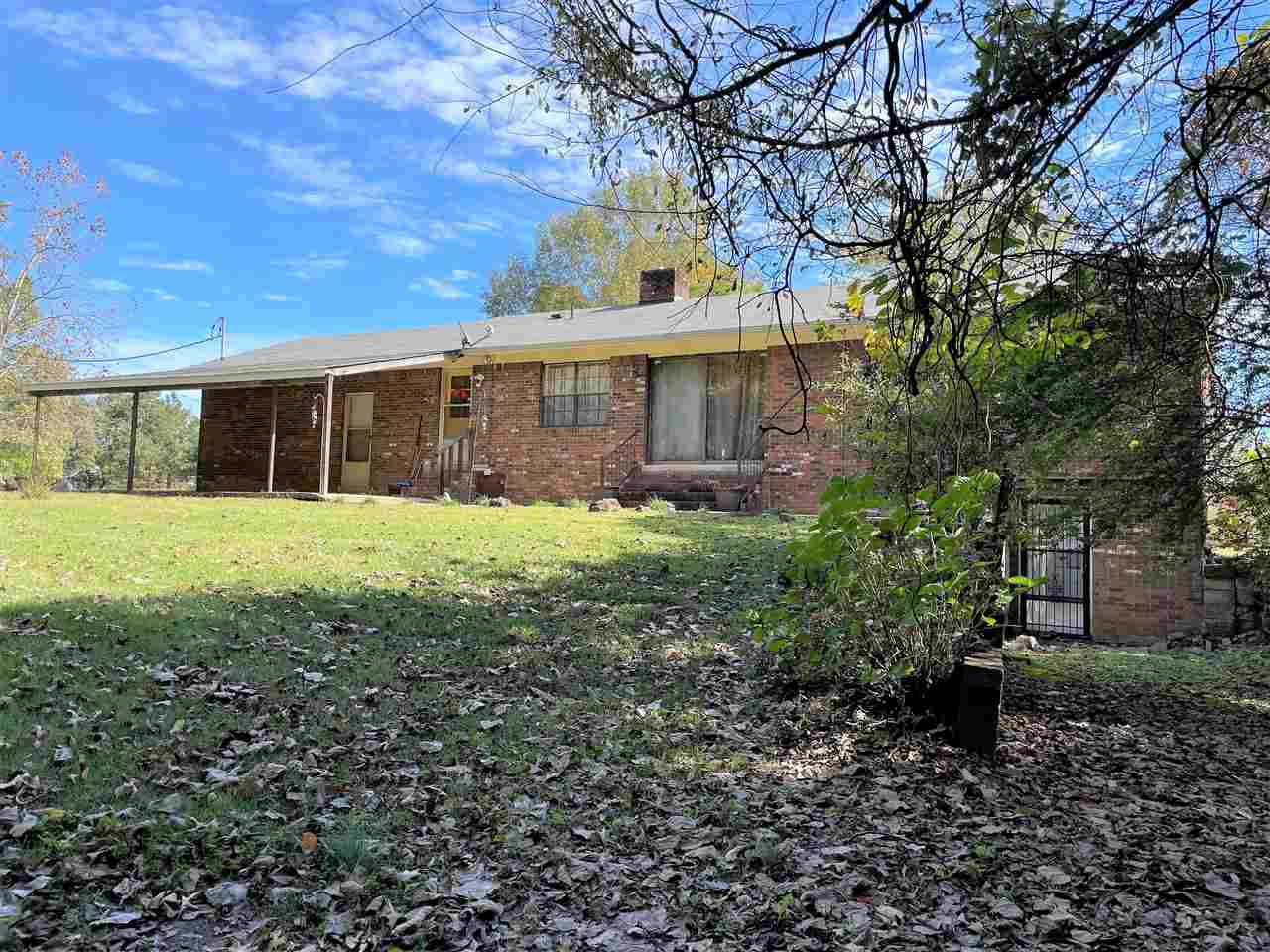 3990 Ebenezer Road Toone, TN 38381 - Photo 4 of 21 a view of a house with a yard