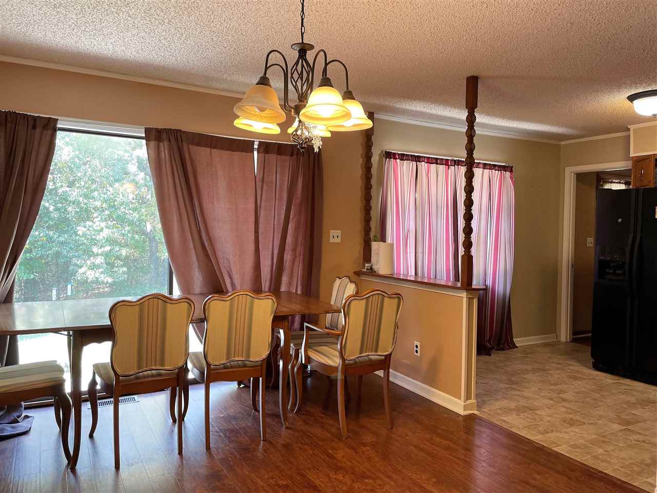 3990 Ebenezer Road Toone, TN 38381 - Photo 7 of 21 a view of a dining room with furniture window and wooden floor