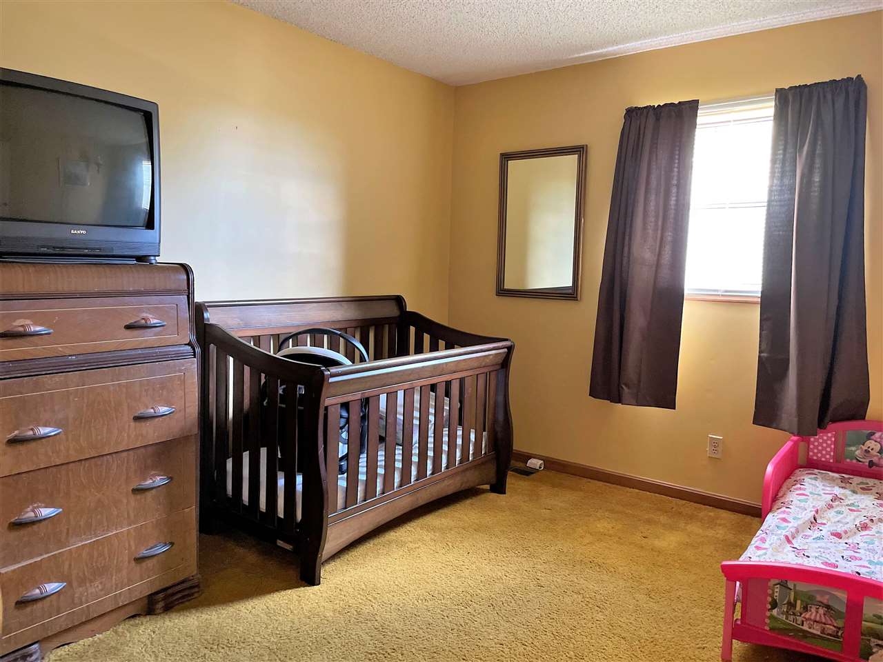 3990 Ebenezer Road Toone, TN 38381 - Photo 8 of 21 a view of livingroom with furniture and wooden floor