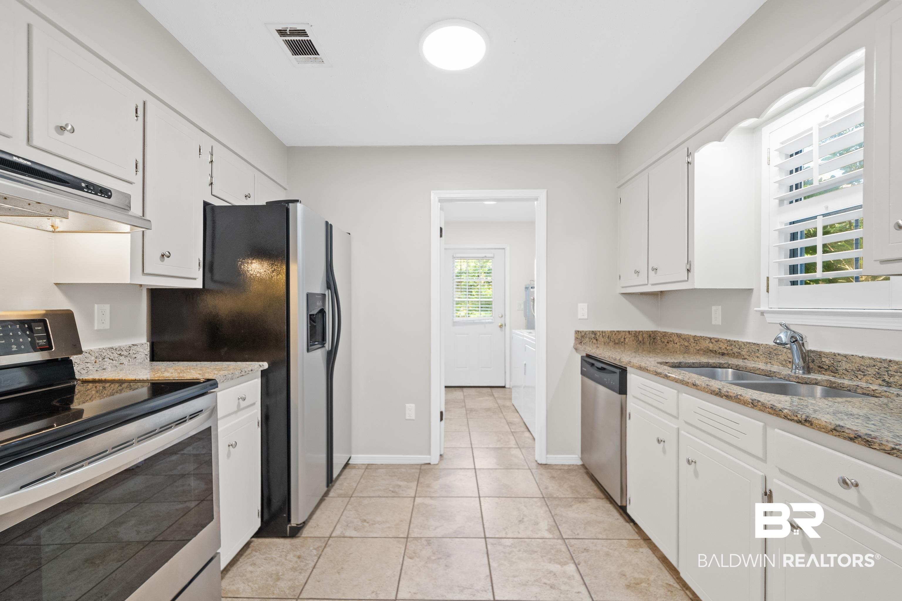 306 Liberty Street Fairhope, AL 36532 - Photo 12 of 32 Featuring stainless steel appliances.