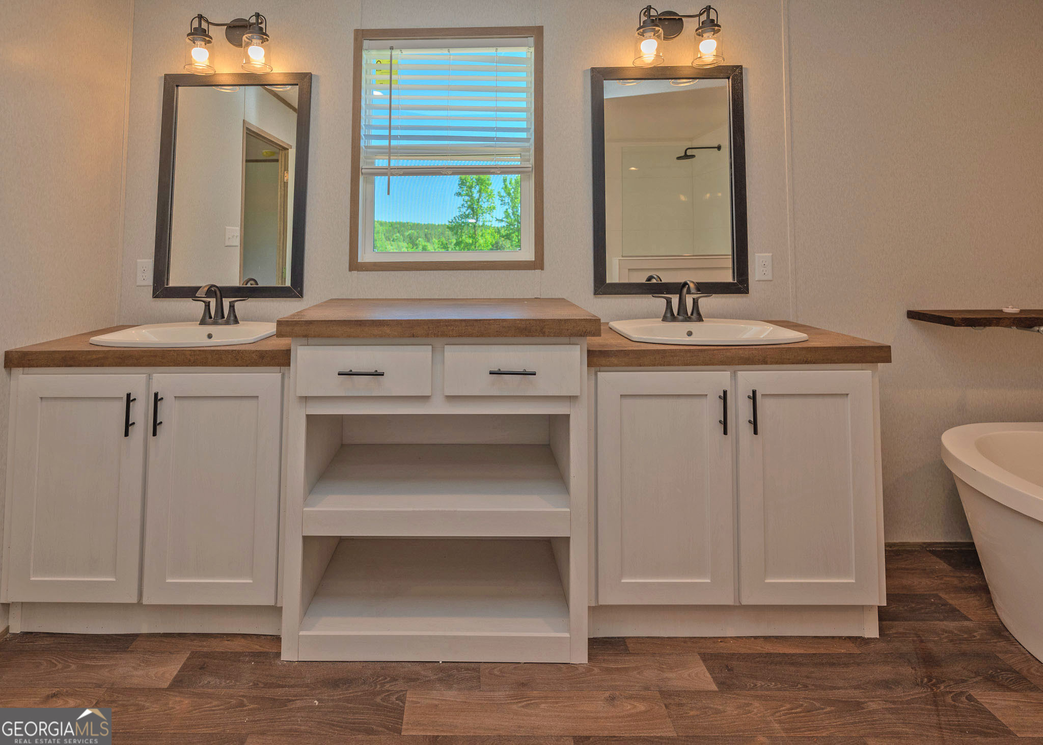 413 Griffin Road Martin, GA 30557 - Photo 16 of 31 a bathroom with a sink and a mirror