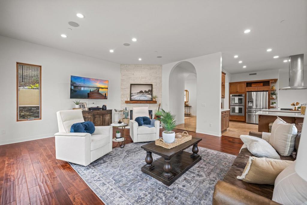 4149 Manchester Avenue Encinitas, CA 92024 - Photo 23 of 60 a living room with furniture and a wooden floor