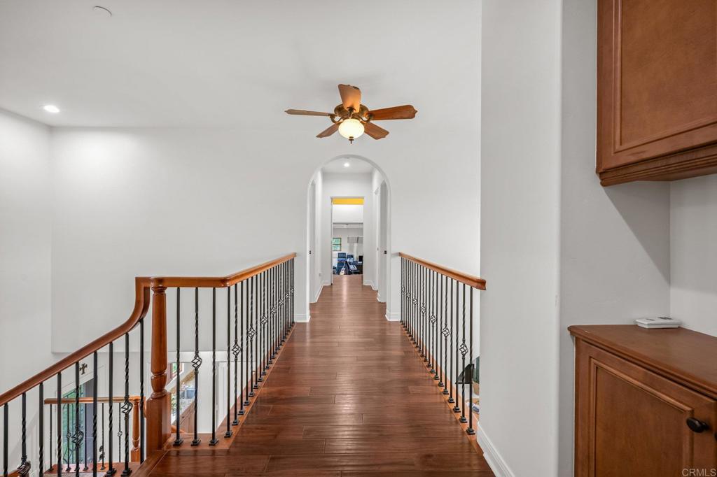 4149 Manchester Avenue Encinitas, CA 92024 - Photo 38 of 60 a view of a hallway with wooden floor and staircase