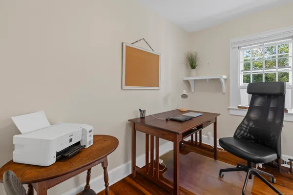 a room with furniture and a window