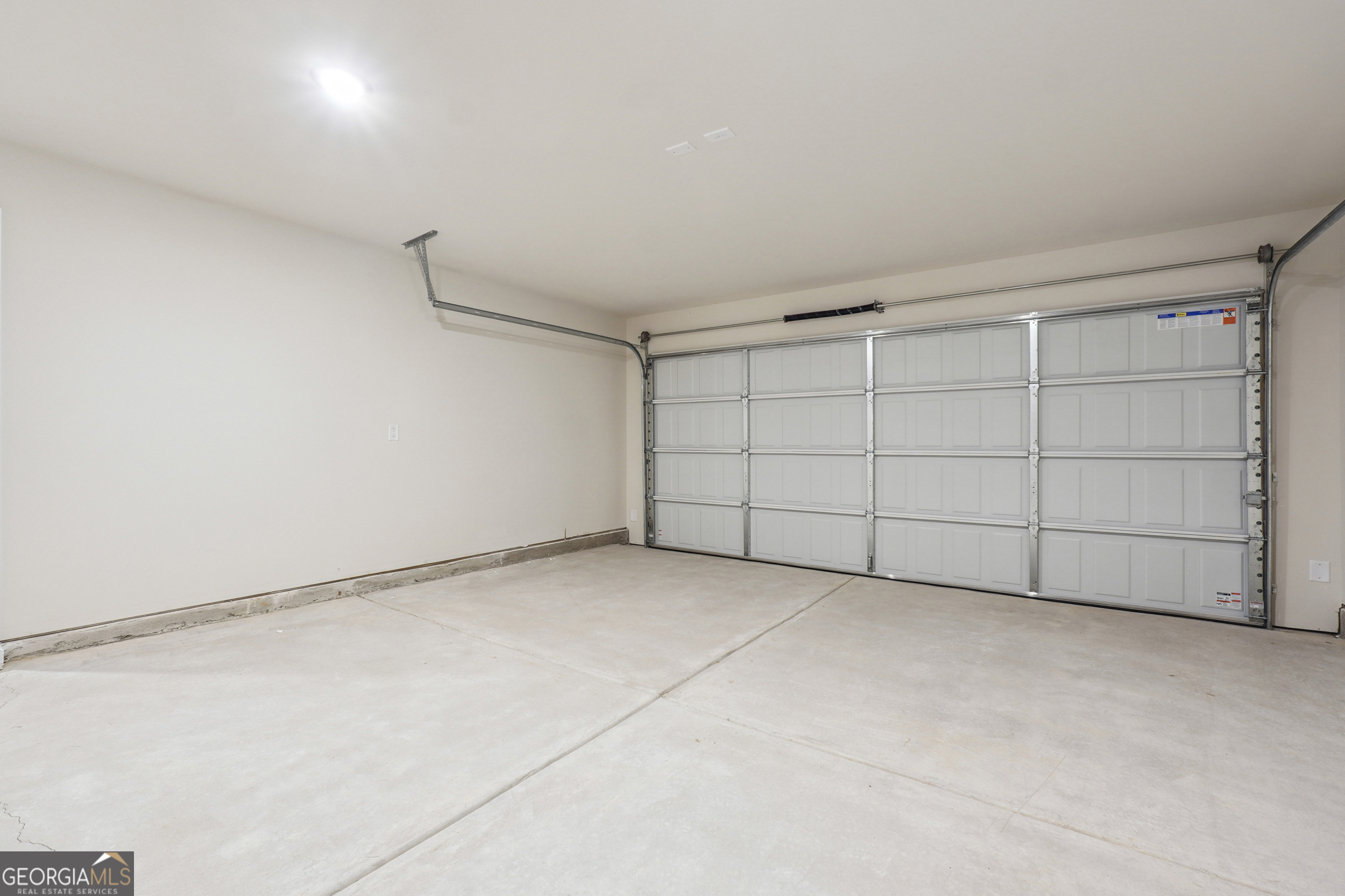 201 Harris Walk, Unit 20 West Point, GA 31833 - Photo 25 of 25 a view of a garage