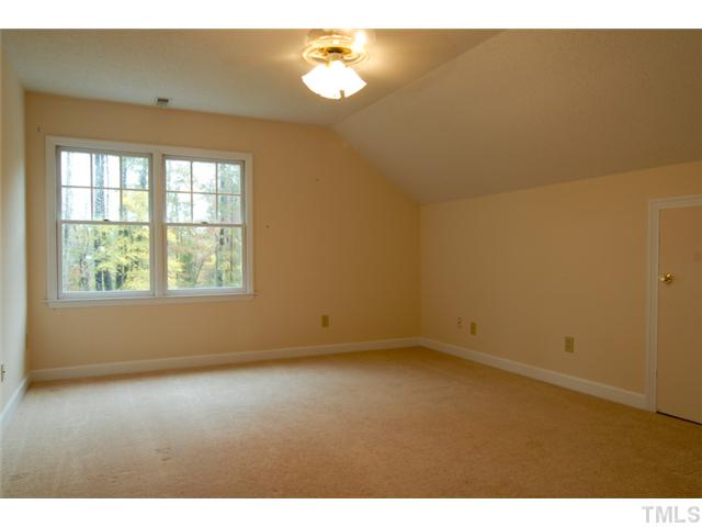 676 Highland Road Apex, NC 27523 - Photo 14 of 19 Three spacious bedrooms on the second level.