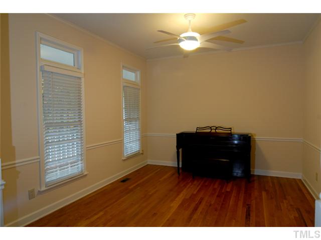 676 Highland Road Apex, NC 27523 - Photo 4 of 19 The house features hardwood and ceramic floors,