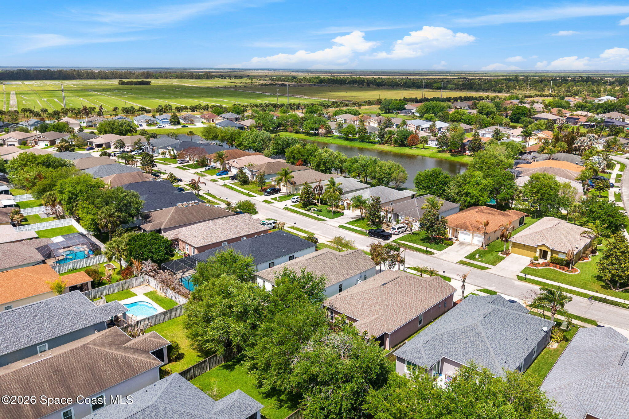 3751 Manitoba Way Rockledge, FL 32955 - Photo 59 of 64 an aerial view of residential houses with outdoor space