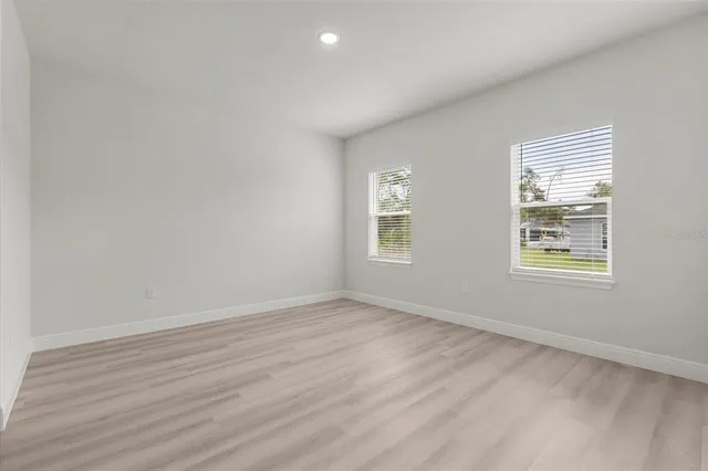 an empty room with windows