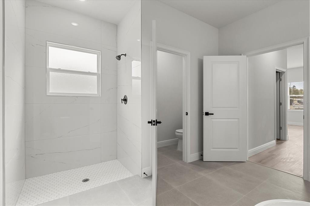 4016 Southwest 151st Street Ocala, FL 34473 - Photo 22 of 32 a bathroom with a bathtub