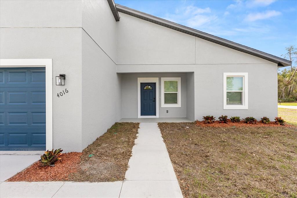 4016 Southwest 151st Street Ocala, FL 34473 - Photo 3 of 32 a view of a house with backyard
