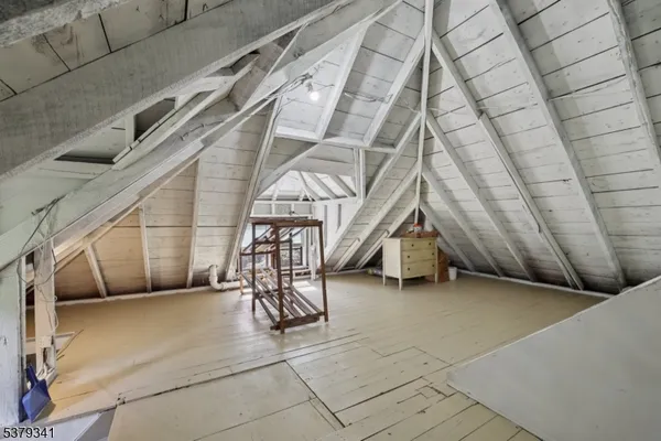 a view of a hallway with an empty room