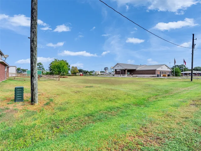 a view of a street with a building