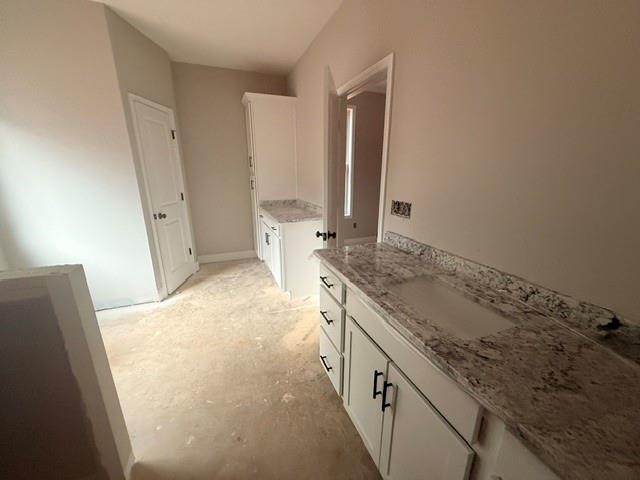 745 Mulberry Rock Road Temple, GA 30179 - Photo 27 of 33 a bathroom with a granite countertop sink and a mirror