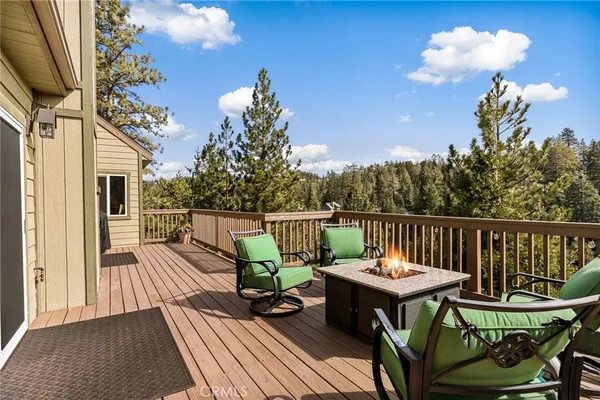 a view of a chairs on the roof deck