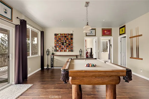 a very nice looking dining room with a table and chairs