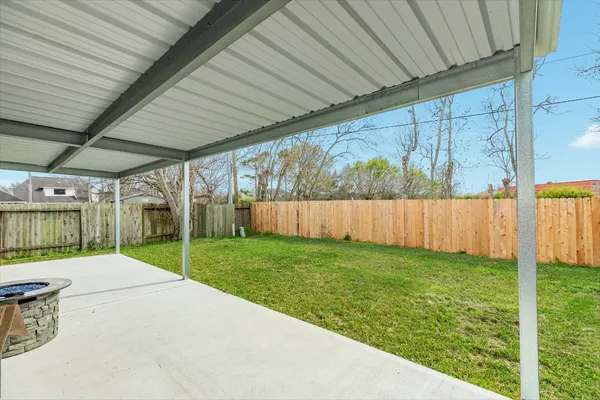 a view of a backyard with a garden