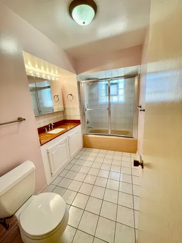 a bathroom with a sink and a shower