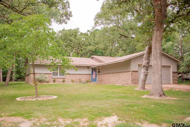 a front view of house with yard